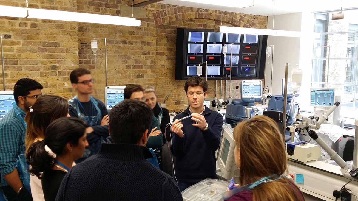 Tom Butler teaching cataract surgery to the next generation